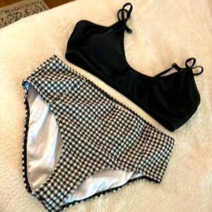 Two piece bathing suit. Black and white gingham bottom, black top. XL